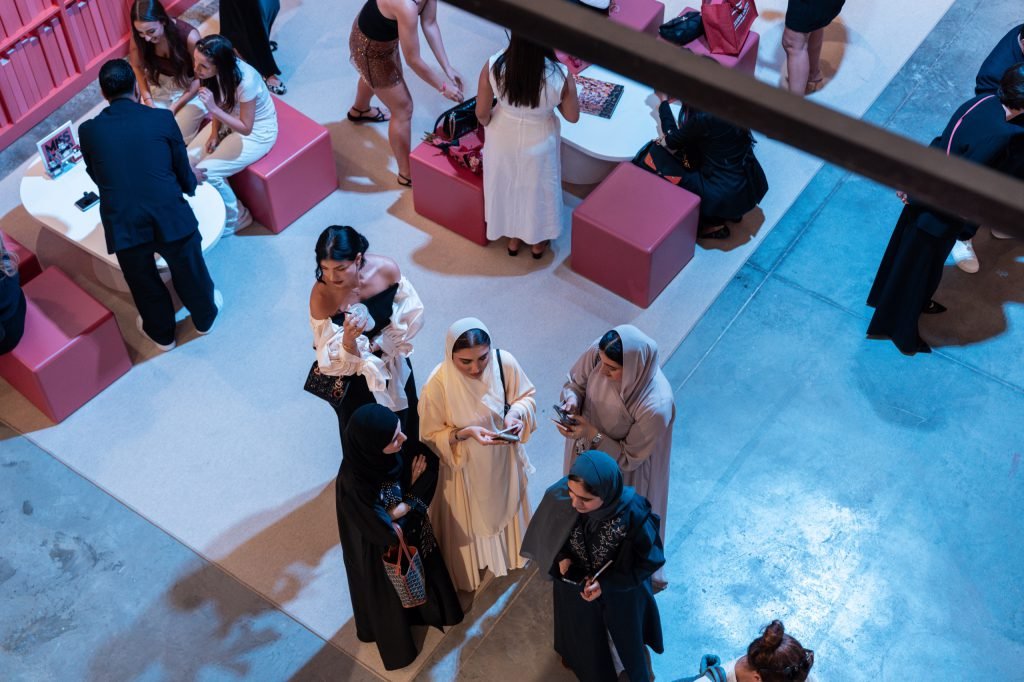 Overhead view of guests at the Miss Dior Café